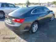 2018 Chevrolet Malibu LT z VIN 1G1ZD5ST8JF166998, wystawiony jako IAAI lot #43354038 z przebiegiem 100 794 mil mil oraz . Historia ofert i sprzedaży dostępna na DreamBid. Obrazek 4.