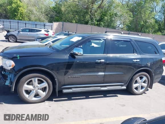 2013 Dodge Durango Citadel with VIN 1C4SDJET5DC602192, listed as a IAAI auction lot 42316259 with 176,764 mi miles and . Bid and sale history available at DreamBid. Image 14.