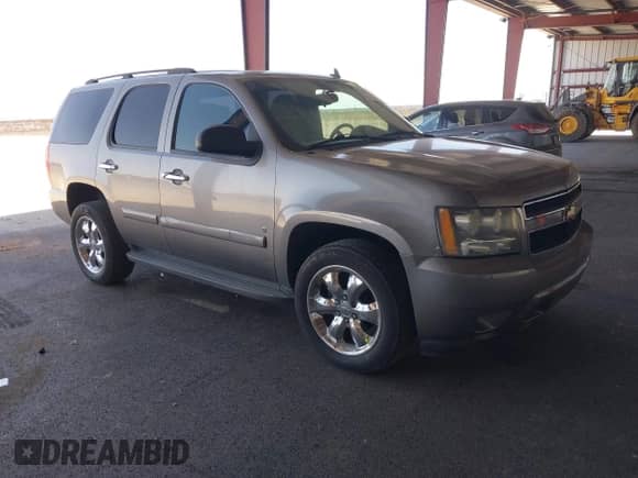 2009 Chevrolet Tahoe LS z VIN 1GNFC13029R219805, wystawiony jako IAAI lot #43089529 z przebiegiem 162 494 mil mil oraz . Historia ofert i sprzedaży dostępna na DreamBid. Obrazek 1.