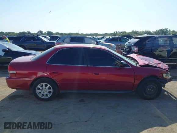 2002 Honda Accord SE z VIN 1HGCG66862A077088, wystawiony jako IAAI lot #43005506 z przebiegiem 183 261 mil mil oraz . Historia ofert i sprzedaży dostępna na DreamBid. Obrazek 13.