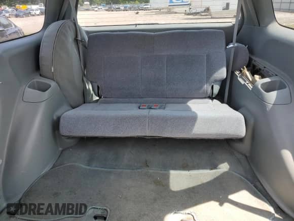 1996 Honda Odyssey z VIN JHMRA1840TC015701, wystawiony jako Copart lot #60103885 z przebiegiem 158 416 mil mil oraz Szkoda całkowita • Salvage title. Historia ofert i sprzedaży dostępna na DreamBid. Obrazek 10.