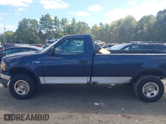 2003 Ford F-150 XL z VIN 1FTRF18263NA54847, wystawiony jako IAAI lot #43050454 z przebiegiem Nie podano mil oraz . Historia ofert i sprzedaży dostępna na DreamBid. Obrazek 14.