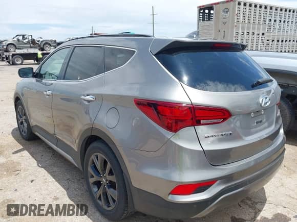 2018 Hyundai Santa Fe Ultimate with VIN 5XYZWDLAXJG531204, listed as a IAAI auction lot 42473418 with 90,726 mi miles and . Bid and sale history available at DreamBid. Image 3.
