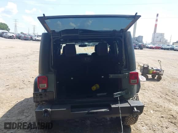 2014 Jeep Wrangler Sahara с VIN 1C4AJWBG5EL141201, выставлен на аукционе IAAI как лот 42873077 с пробегом 111 632 миль миль и . История ставок и продаж доступна на DreamBid. Изображение 16.