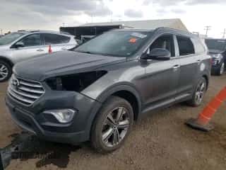 2014 Hyundai Santa Fe GLS z VIN KM8SRDHF9EU052690, wystawiony jako Copart lot #65240715 z przebiegiem 165 379 mil mil oraz Szkoda całkowita • Salvage title. Historia ofert i sprzedaży dostępna na DreamBid. Obrazek 1.