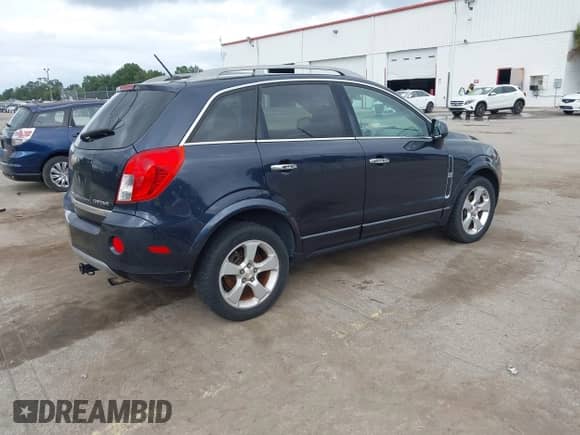 2014 Chevrolet Captiva Sport LT with VIN 3GNAL3EK1ES674690, listed as a IAAI auction lot 43353613 with 149,304 mi miles and . Bid and sale history available at DreamBid. Image 4.