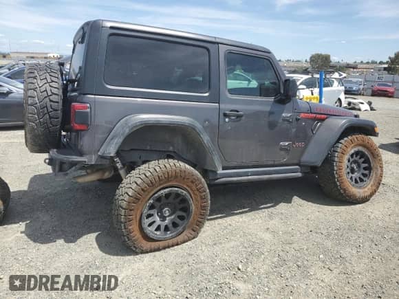 2020 Jeep Wrangler Rubicon with VIN 1C4HJXCG6LW242469, listed as a Copart auction lot 56965025 with Not provided miles and Salvage title. Bid and sale history available at DreamBid. Image 3.