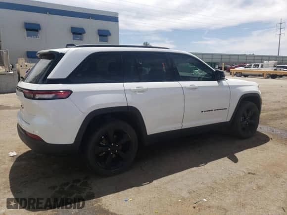 2023 Jeep Grand Cherokee Altitude with VIN 1C4RJHAG9PC659329, listed as a Copart auction lot 57839295 with Not provided miles and Salvage title. Bid and sale history available at DreamBid. Image 3.