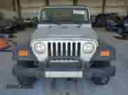 2003 Jeep Wrangler Rubicon с VIN 1J4FA69S23P375067, выставлен на аукционе Copart как лот 82678265 с пробегом 127 304 миль миль и Чистый • Clean title. История ставок и продаж доступна на DreamBid. Изображение 5.