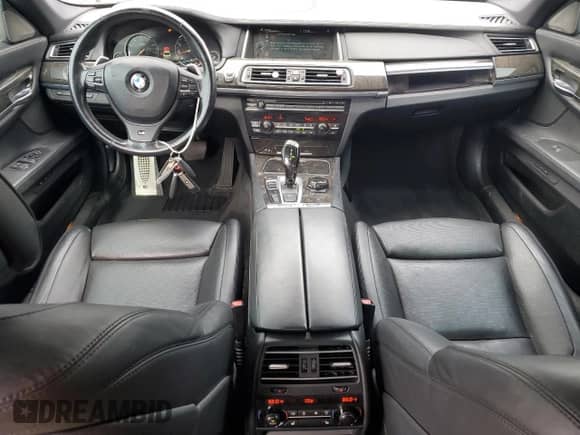 2014 BMW 7 Series 750i xDrive with VIN WBAYB6C53ED224559, listed as a Copart auction lot 58124485 with 114,753 mi miles and Salvage title. Bid and sale history available at DreamBid. Image 8.