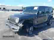 2021 Jeep Wrangler Unlimited Sahara z VIN 1C4HJXEN3MW525716, wystawiony jako IAAI lot #42974390 z przebiegiem 87 931 mil mil oraz . Historia ofert i sprzedaży dostępna na DreamBid. Obrazek 2.