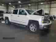 2015 Chevrolet Silverado 1500 LTZ with VIN 3GCUKSEC6FG127124, listed as a Copart auction lot 71790105 with 202,978 mi miles and Salvage title. Bid and sale history available at DreamBid. Image 4.