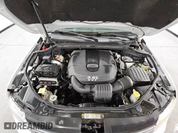 2013 Jeep Grand Cherokee Limited z VIN 1C4RJFBG3DC520134, wystawiony jako Copart lot #84387515 z przebiegiem 153 138 mil mil oraz Czysty tytuł • Clean title. Historia ofert i sprzedaży dostępna na DreamBid. Obrazek 11.