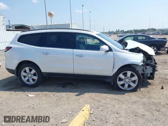 2017 Chevrolet Traverse LT with VIN 1GNKRGKD2HJ115431, listed as a IAAI auction lot 43246521 with 87,708 mi miles and . Bid and sale history available at DreamBid. Image 14.