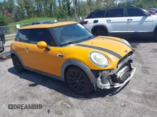 2014 MINI Hardtop with VIN WMWXM5C56ET934996, listed as a IAAI auction lot 43128296 with 91,188 mi miles and . Bid and sale history available at DreamBid. Image 1.