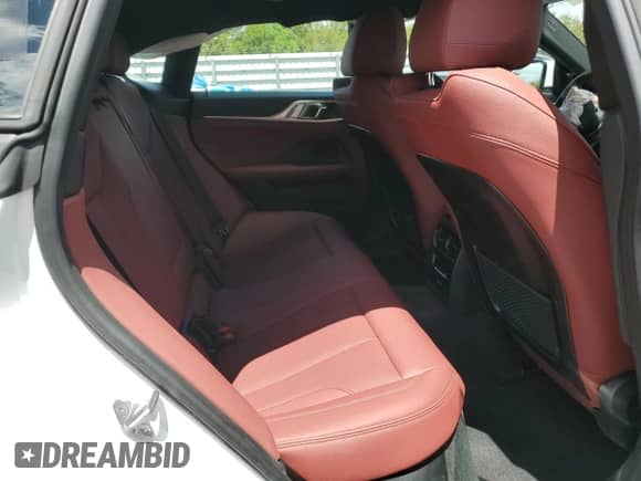 2023 BMW i4 eDrive35 z VIN WBY43AW0XPFP76986, wystawiony jako Copart lot #50745225 z przebiegiem 14 128 mil mil oraz Szkoda całkowita • Salvage title. Historia ofert i sprzedaży dostępna na DreamBid. Obrazek 10.