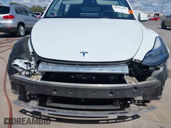 2023 Tesla Model Y Long Range with VIN 7SAYGDEE6PA078790, listed as a IAAI auction lot 43261075 with 20,370 mi miles and . Bid and sale history available at DreamBid. Image 6.