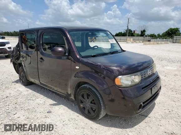 2012 Nissan Cube SL с VIN JN8AZ2KRXCT253710, выставлен на аукционе Copart как лот 61392915 с пробегом 164 438 миль миль и Списание • Salvage title. История ставок и продаж доступна на DreamBid. Изображение 4.