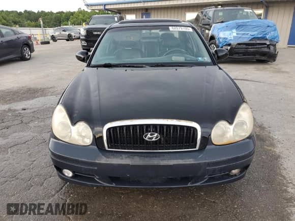 2002 Hyundai Sonata GLS z VIN KMHWF35H42A591337, wystawiony jako Copart lot #62079195 z przebiegiem 244 974 mil mil oraz Szkoda całkowita • Salvage title. Historia ofert i sprzedaży dostępna na DreamBid. Obrazek 5.