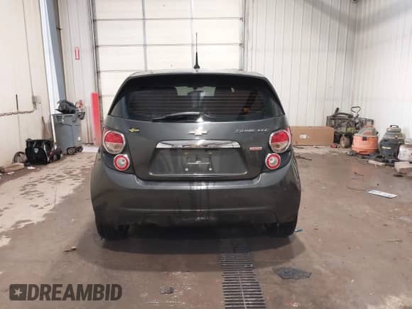 2014 Chevrolet Sonic LTZ with VIN 1G1JE6SB2E4130099, listed as a IAAI auction lot 41568613 with 133,572 mi miles and . Bid and sale history available at DreamBid. Image 16.