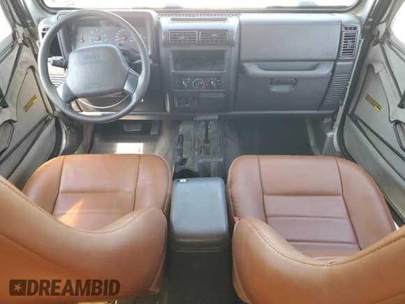 2002 Jeep Wrangler X with VIN 1J4FA39S02P750998, listed as a Copart auction lot 66619075 with 98,985 mi miles and Clean title. Bid and sale history available at DreamBid. Image 8.