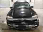 2003 Chevrolet TrailBlazer EXT LT z VIN 1GNET16S736138543, wystawiony jako Copart lot #65465275 z przebiegiem 247 030 mil mil oraz Szkoda całkowita • Salvage title. Historia ofert i sprzedaży dostępna na DreamBid. Obrazek 5.