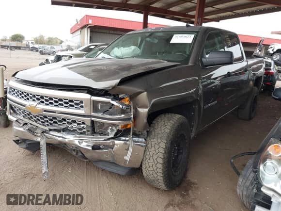 2014 Chevrolet Silverado 1500 LT with VIN 3GCUKREH6EG381743, listed as a IAAI auction lot 41583823 with 141,671 mi miles and . Bid and sale history available at DreamBid. Image 18.