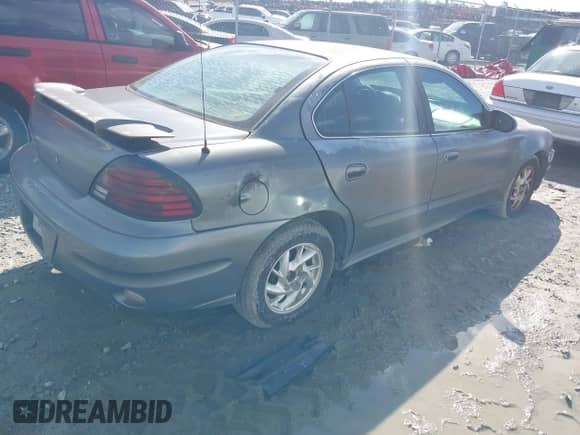 2004 Pontiac Grand Am SE1 with VIN 1G2NF52F04M513755, listed as a IAAI auction lot 41600613 with Not provided miles and . Bid and sale history available at DreamBid. Image 4.