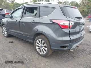 2017 Ford Escape Titanium с VIN 1FMCU9JD9HUB78027, выставлен на аукционе IAAI как лот 43263755 с пробегом 137 565 миль миль и . История ставок и продаж доступна на DreamBid. Изображение 3.
