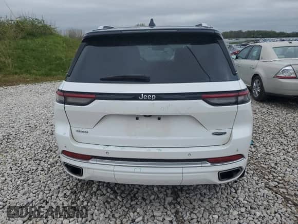 2022 Jeep Grand Cherokee Summit Reserve with VIN 1C4RJHEG1N8576763, listed as a Copart auction lot 55504685 with 56,290 mi miles and Salvage title. Bid and sale history available at DreamBid. Image 6.