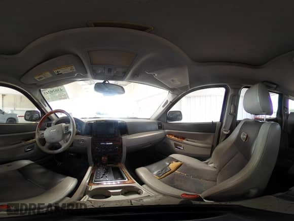 2007 Jeep Grand Cherokee Overland с VIN 1J8HS68257C653317, выставлен на аукционе IAAI как лот 43020243 с пробегом 246 049 миль миль и . История ставок и продаж доступна на DreamBid. Изображение 18.