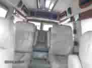 1998 Ford Econoline Cargo Recreational z VIN 1FDRE14L8WHB21173, wystawiony jako IAAI lot #41496604 z przebiegiem 157 117 mil mil oraz . Historia ofert i sprzedaży dostępna na DreamBid. Obrazek 8.