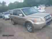 2006 Honda Pilot EX-L z VIN 5FNYF18616B013818, wystawiony jako IAAI lot #42967753 z przebiegiem 160 408 mil mil oraz . Historia ofert i sprzedaży dostępna na DreamBid. Obrazek 1.