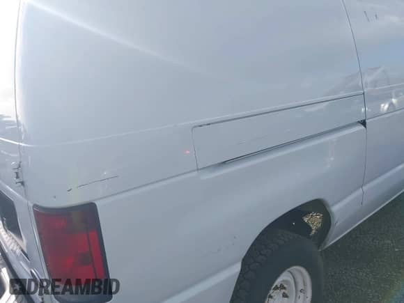 2007 Ford Econoline Cargo Commercial with VIN 1FTNE24W97DA99597, listed as a IAAI auction lot 41700355 with 324,085 mi miles and . Bid and sale history available at DreamBid. Image 6.