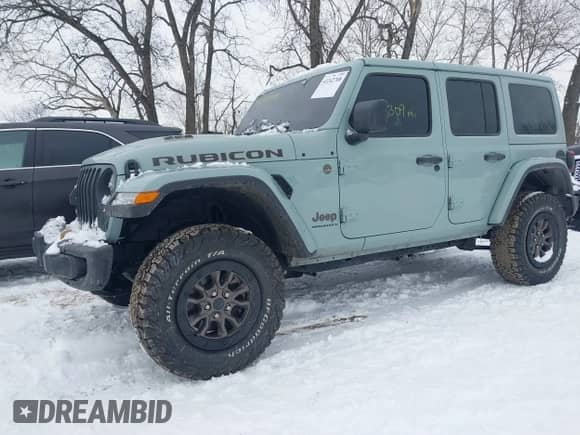 2023 Jeep Wrangler Rubicon 392 with VIN 1C4JJXSJ7PW688280, listed as a IAAI auction lot 41242708 with 8,309 mi miles and . Bid and sale history available at DreamBid. Image 6.