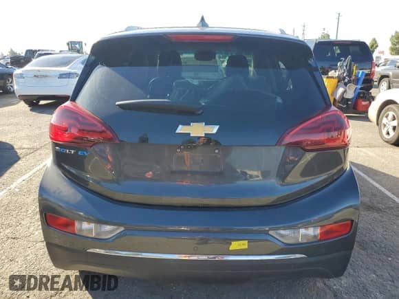 2020 Chevrolet Bolt EV Premier с VIN 1G1FZ6S01L4140581, выставлен на аукционе Copart как лот 86534865 с пробегом 76 371 миль миль и Списание • Salvage title. История ставок и продаж доступна на DreamBid. Изображение 6.