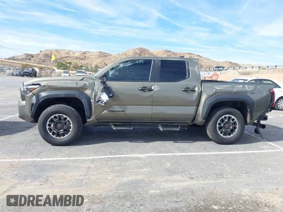 2024 Toyota Tacoma SR5 with VIN 3TMLB5JN6RM027745, listed as a IAAI auction lot 41479793 with 16,376 mi miles and . Bid and sale history available at DreamBid. Image 14.