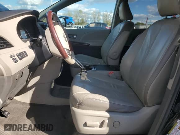 2011 Toyota Sienna XLE AAS with VIN 5TDYK3DC0BS092391, listed as a Copart auction lot 85557835 with 136,793 mi miles and Salvage title. Bid and sale history available at DreamBid. Image 7.