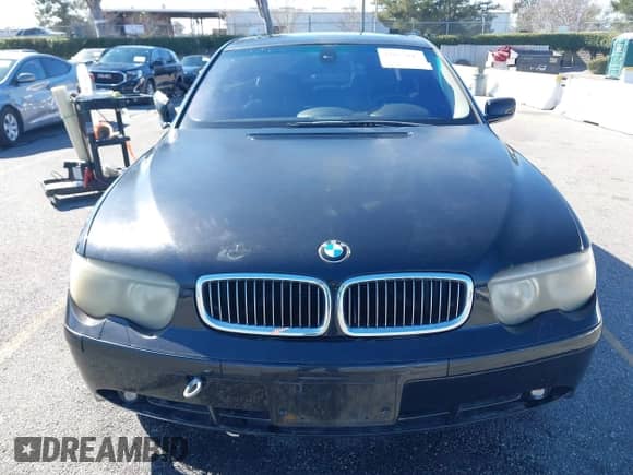 2004 BMW 7 Series 745i with VIN WBAGL63494DP70233, listed as a IAAI auction lot 41622647 with 135,239 mi miles and . Bid and sale history available at DreamBid. Image 12.