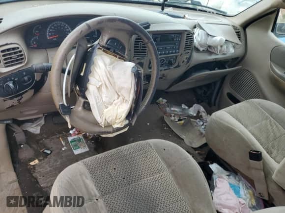 2001 Ford F-150 XL с VIN 2FTRF17W21CA56134, выставлен на аукционе Copart как лот 87249335 с пробегом Не указан миль и Списание • Salvage title. История ставок и продаж доступна на DreamBid. Изображение 8.