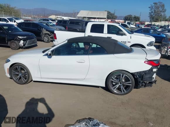 2022 BMW 4 Series 430i with VIN WBA23AT00NCJ33717, listed as a IAAI auction lot 43362808 with 72,222 mi miles and . Bid and sale history available at DreamBid. Image 15.