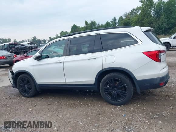 2021 Honda Pilot Special Edition with VIN 5FNYF6H22MB034734, listed as a IAAI auction lot 43291080 with 162,677 mi miles and . Bid and sale history available at DreamBid. Image 14.