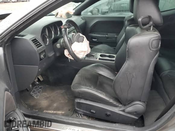 2012 Dodge Challenger SRT-8 392 с VIN 2C3CDYCJ9CH229723, выставлен на аукционе Copart как лот 55267885 с пробегом 62 056 миль миль и Списание • Salvage title. История ставок и продаж доступна на DreamBid. Изображение 7.