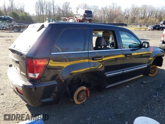 2007 Jeep Grand Cherokee SRT-8 с VIN 1J8HR78347C513091, выставлен на аукционе Copart как лот 49624845 с пробегом Не указан миль и Списание • Salvage title. История ставок и продаж доступна на DreamBid. Изображение 3.