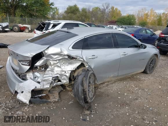 2018 Chevrolet Malibu LS with VIN 1G1ZB5ST6JF112928, listed as a IAAI auction lot 43441262 with 145,593 mi miles and . Bid and sale history available at DreamBid. Image 4.