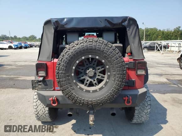 2009 Jeep Wrangler X с VIN 1J4FA241X9L773683, выставлен на аукционе Copart как лот 81265675 с пробегом 124 097 миль миль и Списание • Salvage title. История ставок и продаж доступна на DreamBid. Изображение 6.