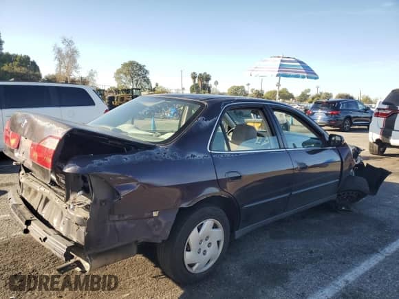 1999 Honda Accord LX with VIN 1HGCG1641XA012320, listed as a Copart auction lot 42543715 with 187,314 mi miles and Salvage title. Bid and sale history available at DreamBid. Image 3.