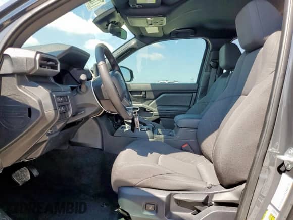 2024 Toyota Tacoma SR with VIN 3TYLD5KN9RT007552, listed as a Copart auction lot 71209225 with 6,045 mi miles and Salvage title. Bid and sale history available at DreamBid. Image 7.