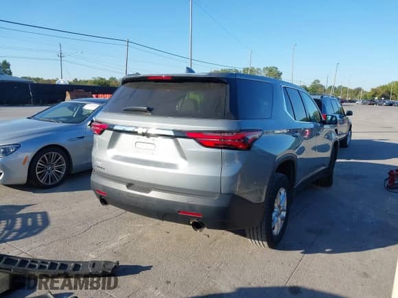 2023 Chevrolet Traverse LS z VIN 1GNERFKW1PJ129120, wystawiony jako IAAI lot #43356431 z przebiegiem 196 853 mil mil oraz . Historia ofert i sprzedaży dostępna na DreamBid. Obrazek 4.