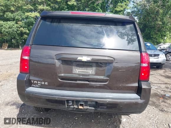 2018 Chevrolet Tahoe LT with VIN 1GNSKBKC4JR156035, listed as a IAAI auction lot 43009937 with 152,555 mi miles and . Bid and sale history available at DreamBid. Image 17.